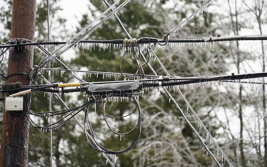 close up of ice on electricity transmission lines